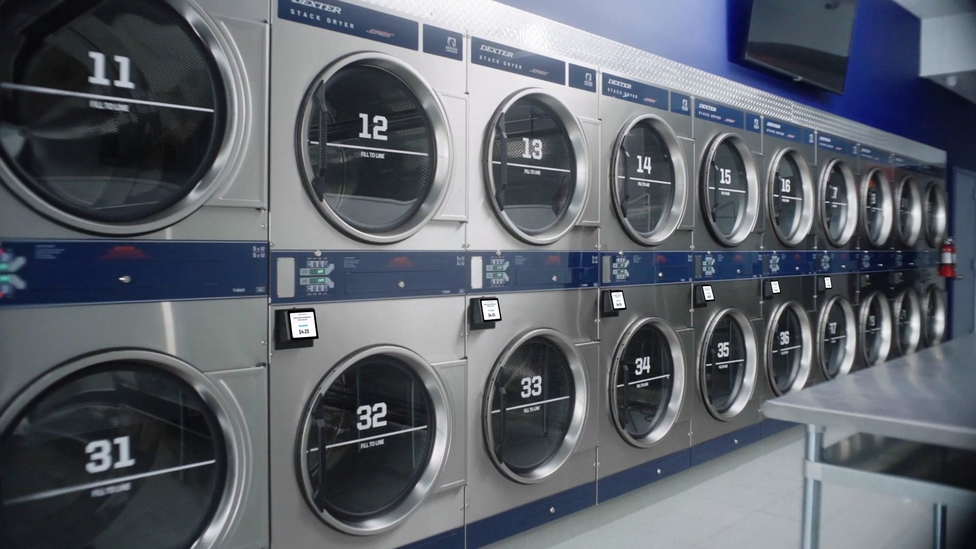 A picture of a row of laundry machines